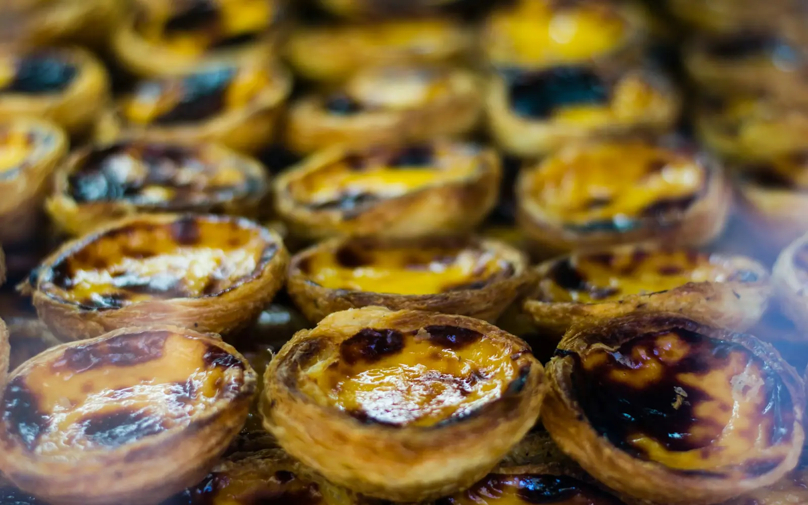 A tray of warm pastéis de nata, the custard tarts of the Pastéis de Belém bakery